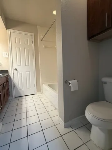 a bathroom with a sink a mirror and a shower