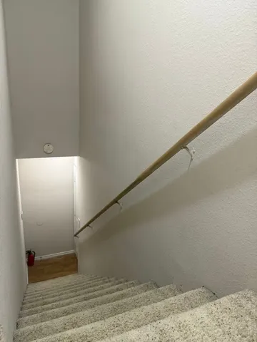 a view of a room with racks on the wall