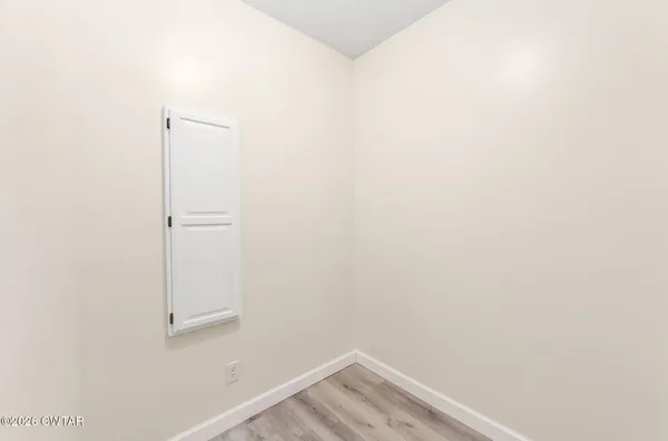 a view of small space with racks on the wall