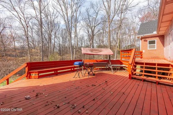 a backyard view with sitting space and seating space