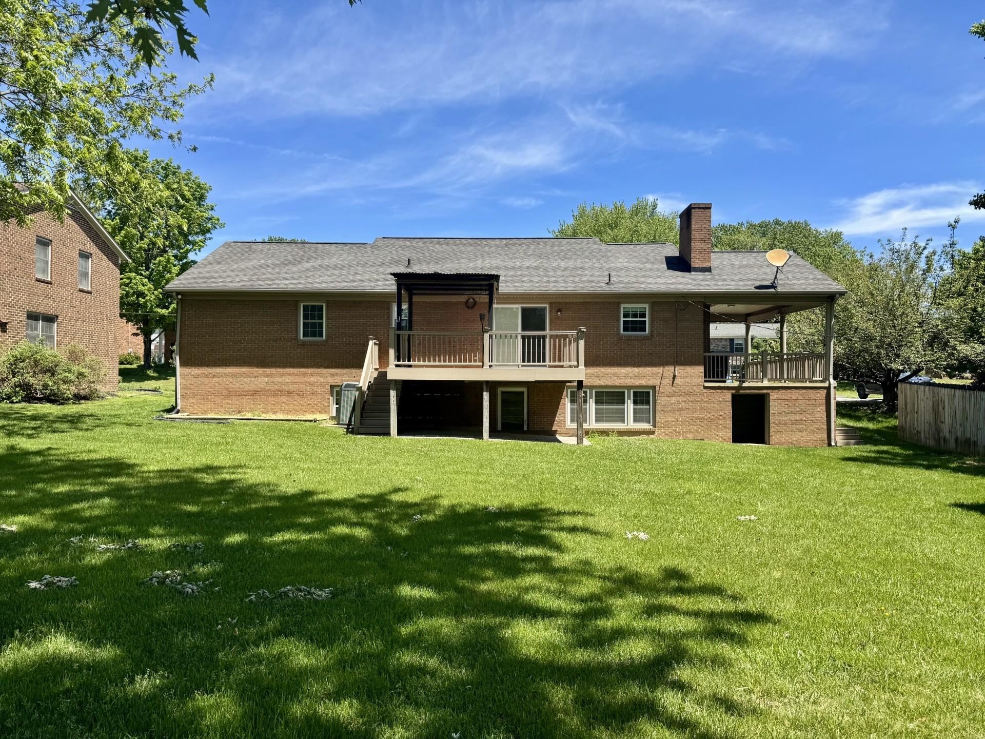 81 Middlebrook Street Harrisonburg, VA 22801 - Photo 22 of 22 a front view of a house with a yard