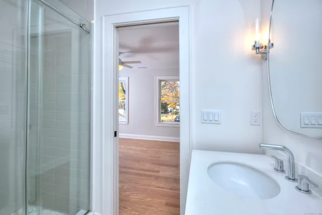 a bathroom with a sink and a mirror