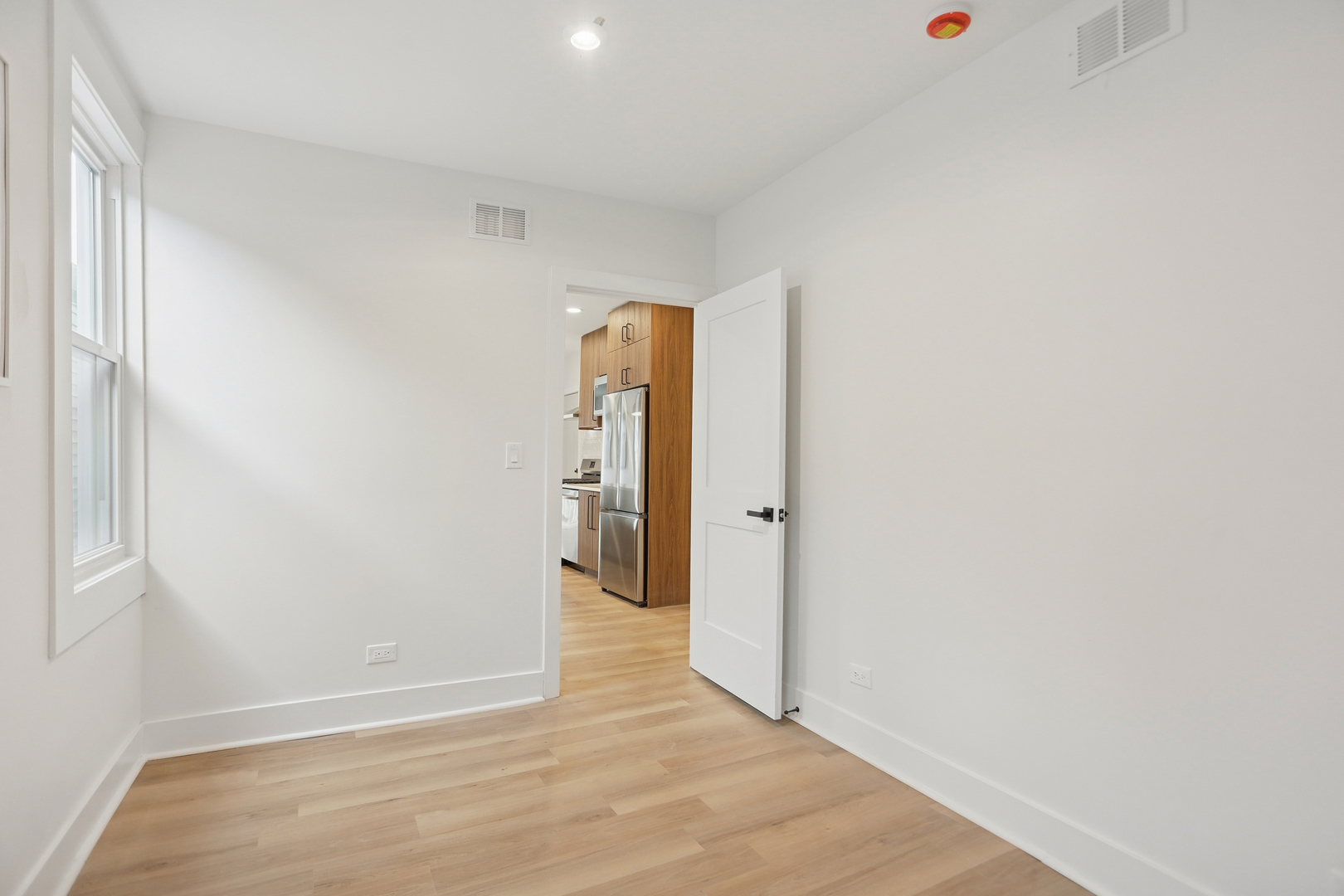 1310 West Erie Street, Unit 2 Chicago, IL 60642 - Photo 12 of 12 a view of an empty room