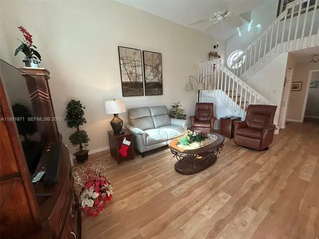 a view of a roof deck with wooden floor