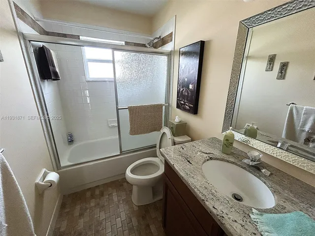 a view of a house with a swimming pool