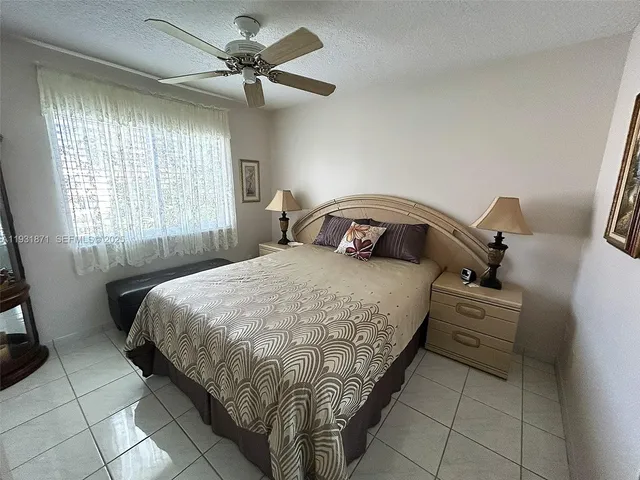 a view of a house with a yard from a patio