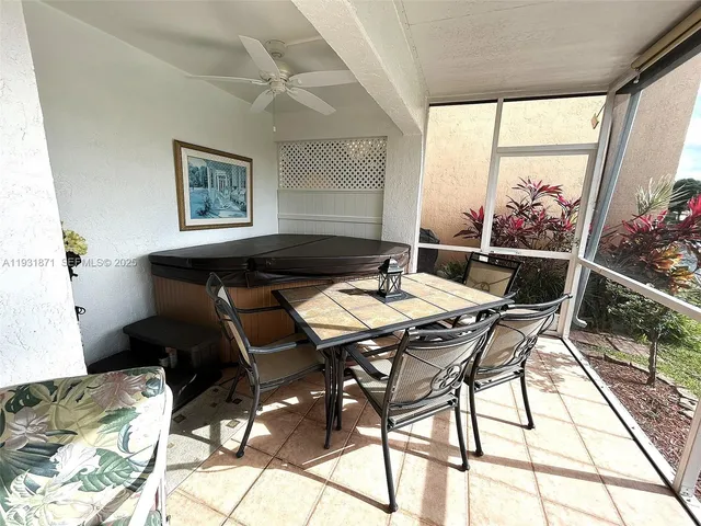 a view of swimming pool from a balcony