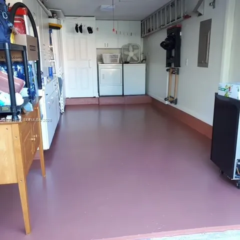 a view of a house with a yard and tree s