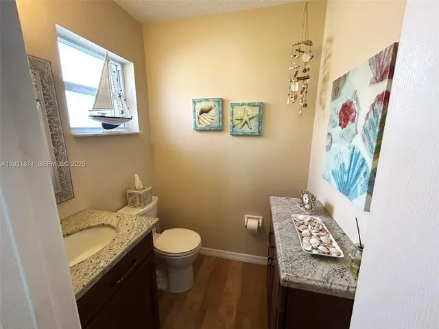 a view of room with window and bathroom