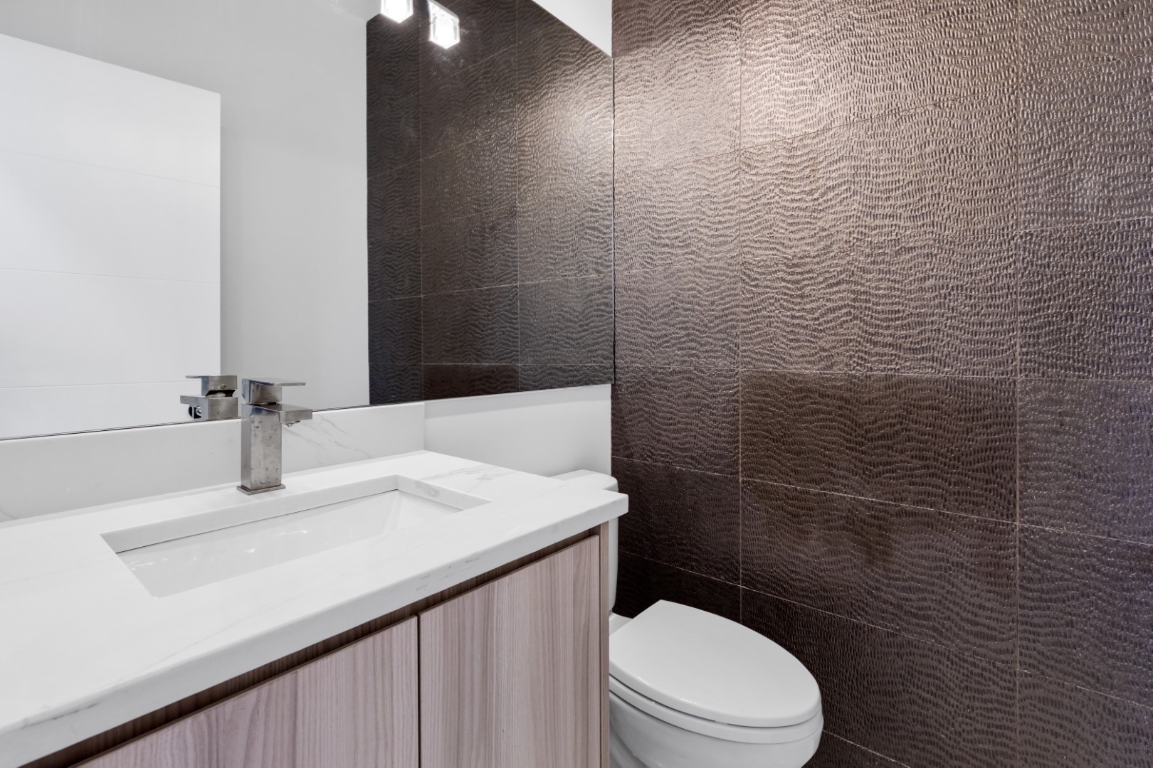 334 East Pershing Road Chicago, IL 60653 - Photo 35 of 86 a bathroom with a sink a toilet and shower