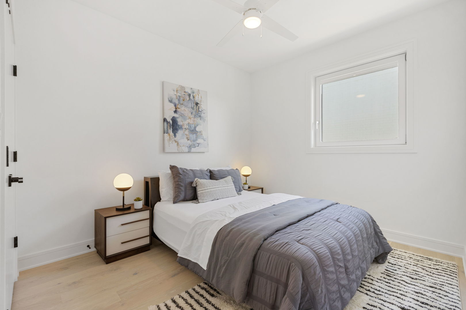 334 East Pershing Road Chicago, IL 60653 - Photo 54 of 86 a bed room with a bed and a night stand