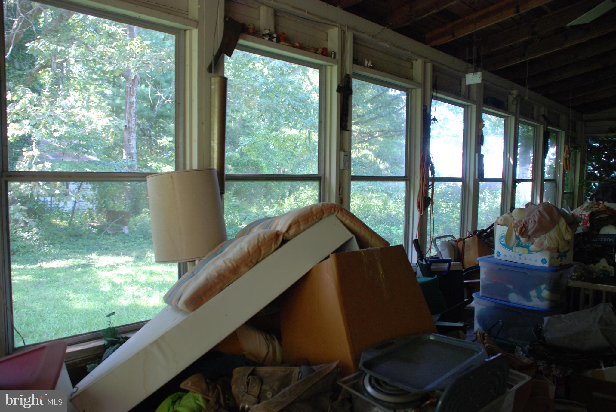 13130 Dutch Hollow Road Culpeper, VA 22701 - Photo 38 of 51 Sun porch interior