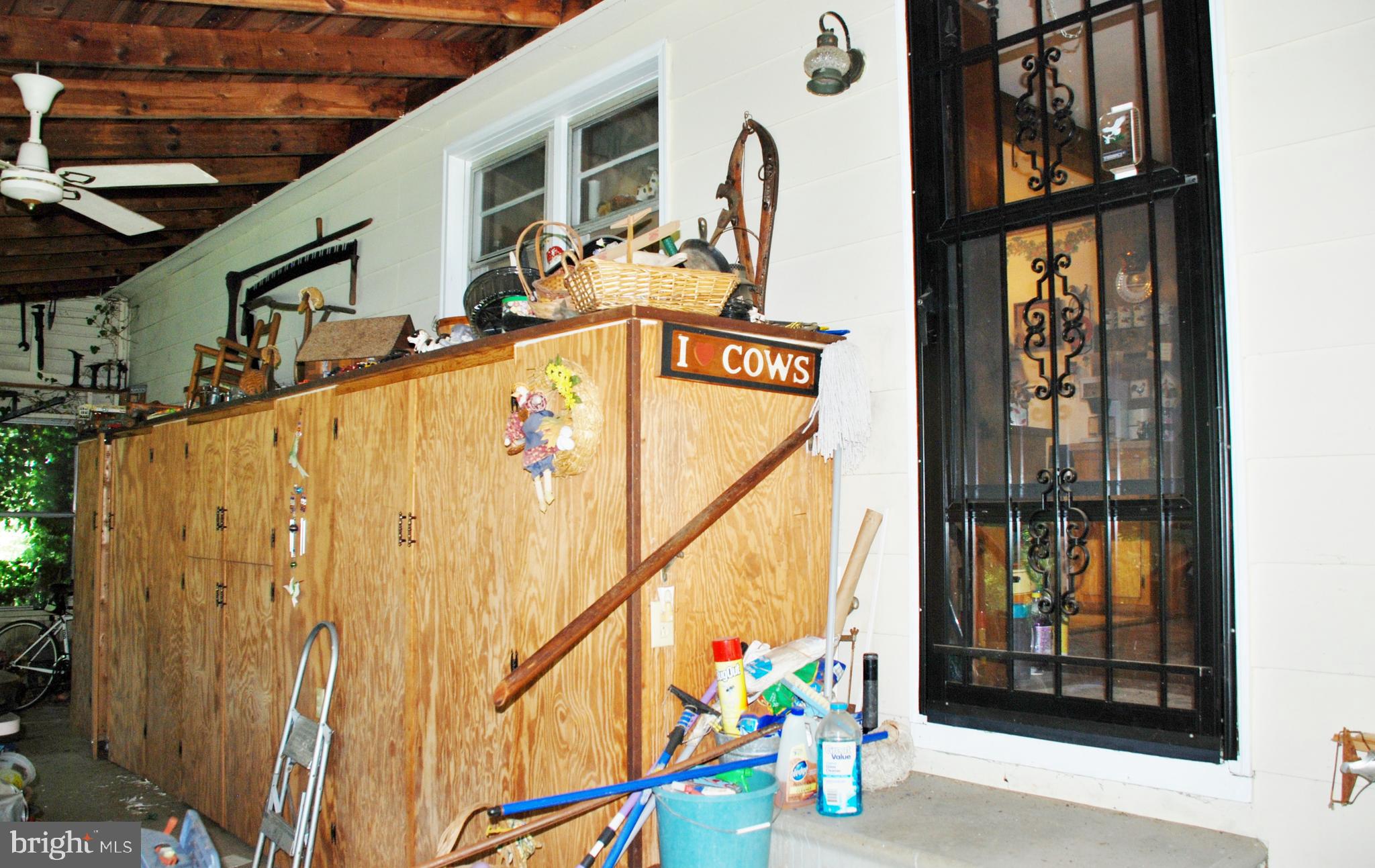 13130 Dutch Hollow Road Culpeper, VA 22701 - Photo 41 of 51 Built in storage on sun porch