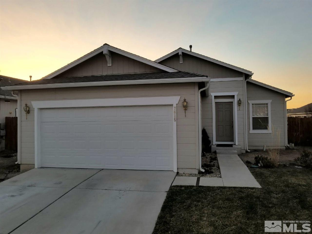 7615 Corso Street Reno, NV 89506 - Photo 1 of 1 a front view of a house with a yard