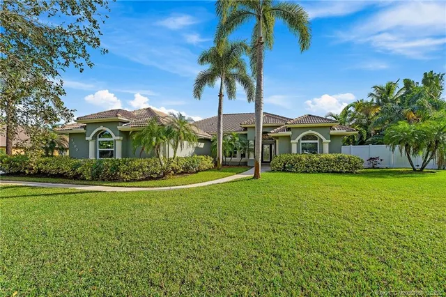 $1,395,000 | 4803 Southwest Lake Grove Circle, Palm City, FL 34990