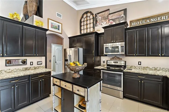 $1,395,000 | 4803 Southwest Lake Grove Circle, Palm City, FL 34990