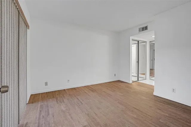 a view of a glass door and porch