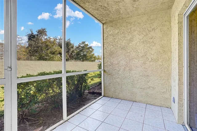 a view of a swimming pool with a deck