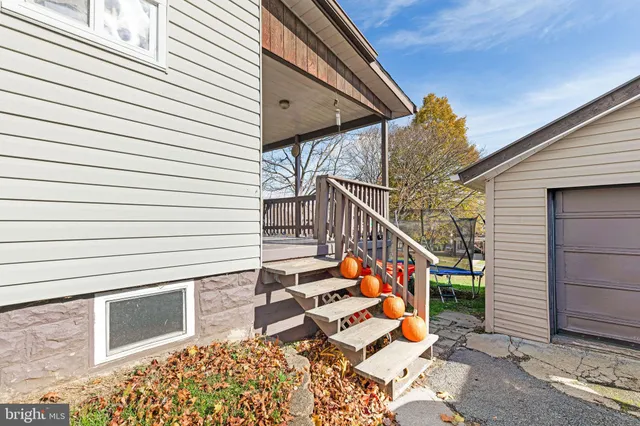 a backyard of a house with seating space