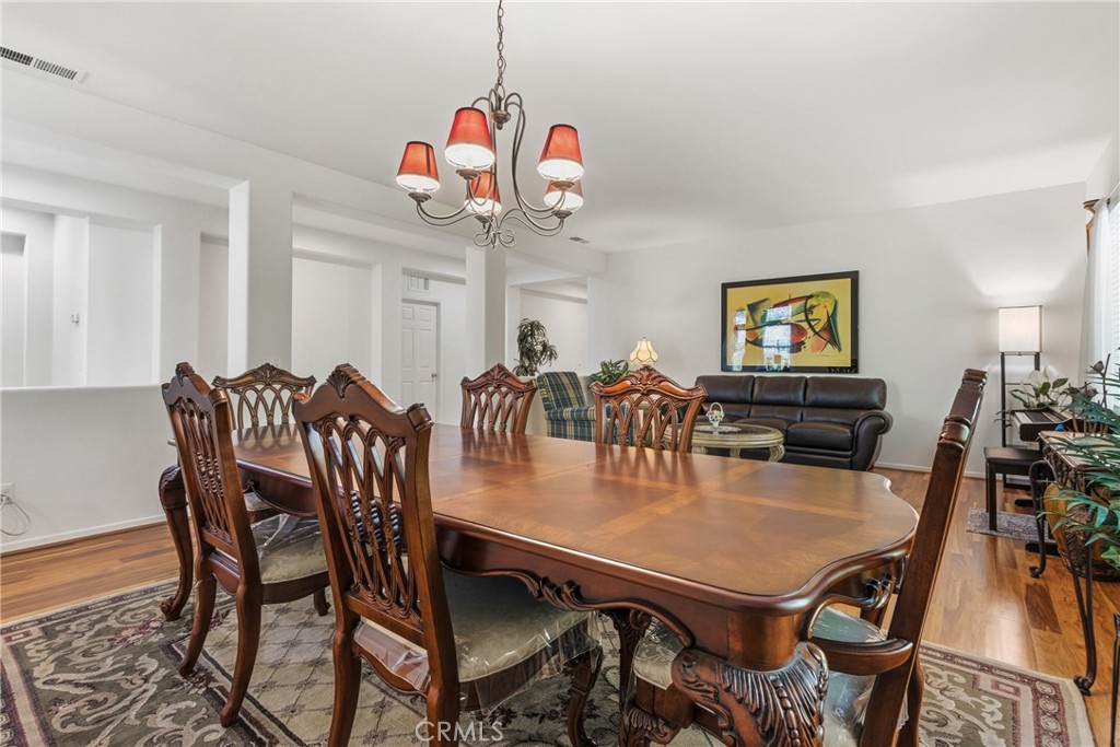 33145 Vermont Road Temecula, CA 92592 - Photo 9 of 41 a view of a dining room with furniture