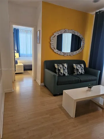 a living room with furniture and a couch