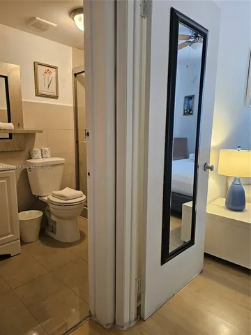 a bathroom with a toilet and a sink