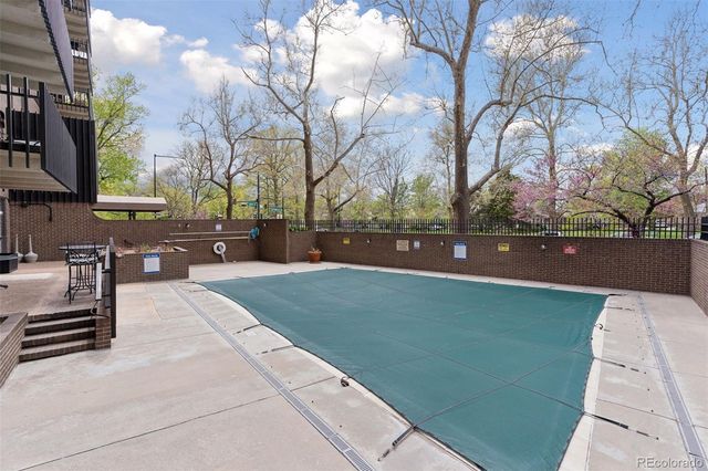 a view of outdoor space with deck and tree