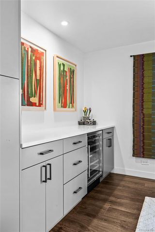a kitchen with cabinets and window