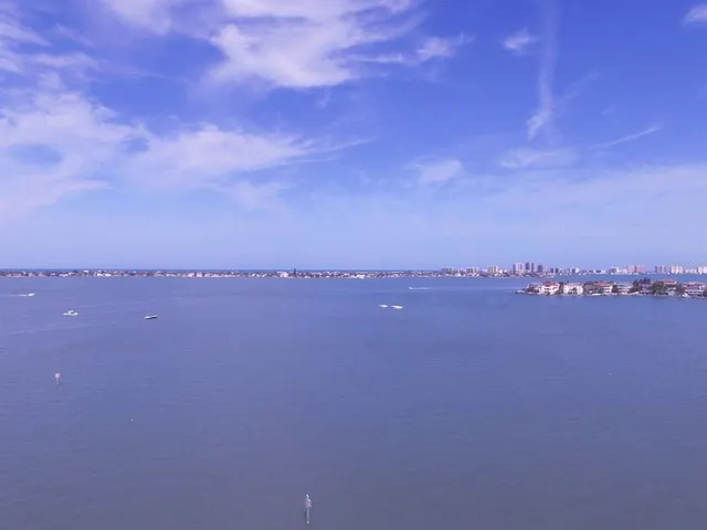 a view of swimming pool with lake view and mountain view