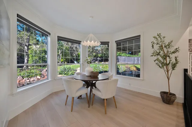 a kitchen with a sink and a stove