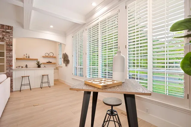 a bathroom with a double vanity sink mirror and shower
