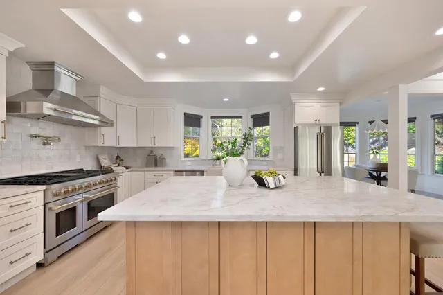 a living room with furniture fireplace and a flat screen tv