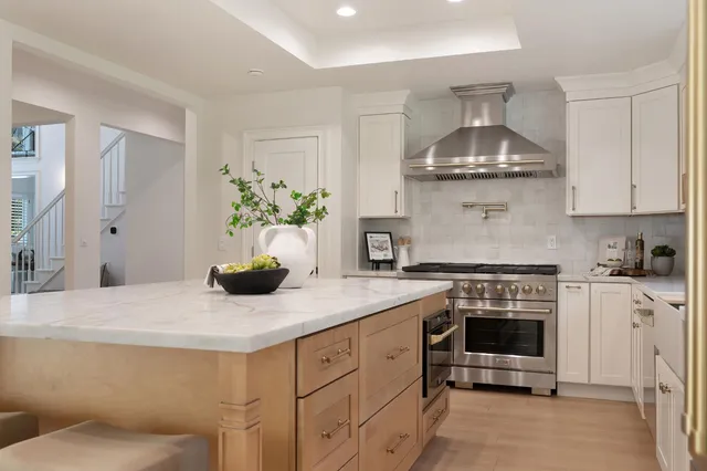 a view of a dining room with furniture and window