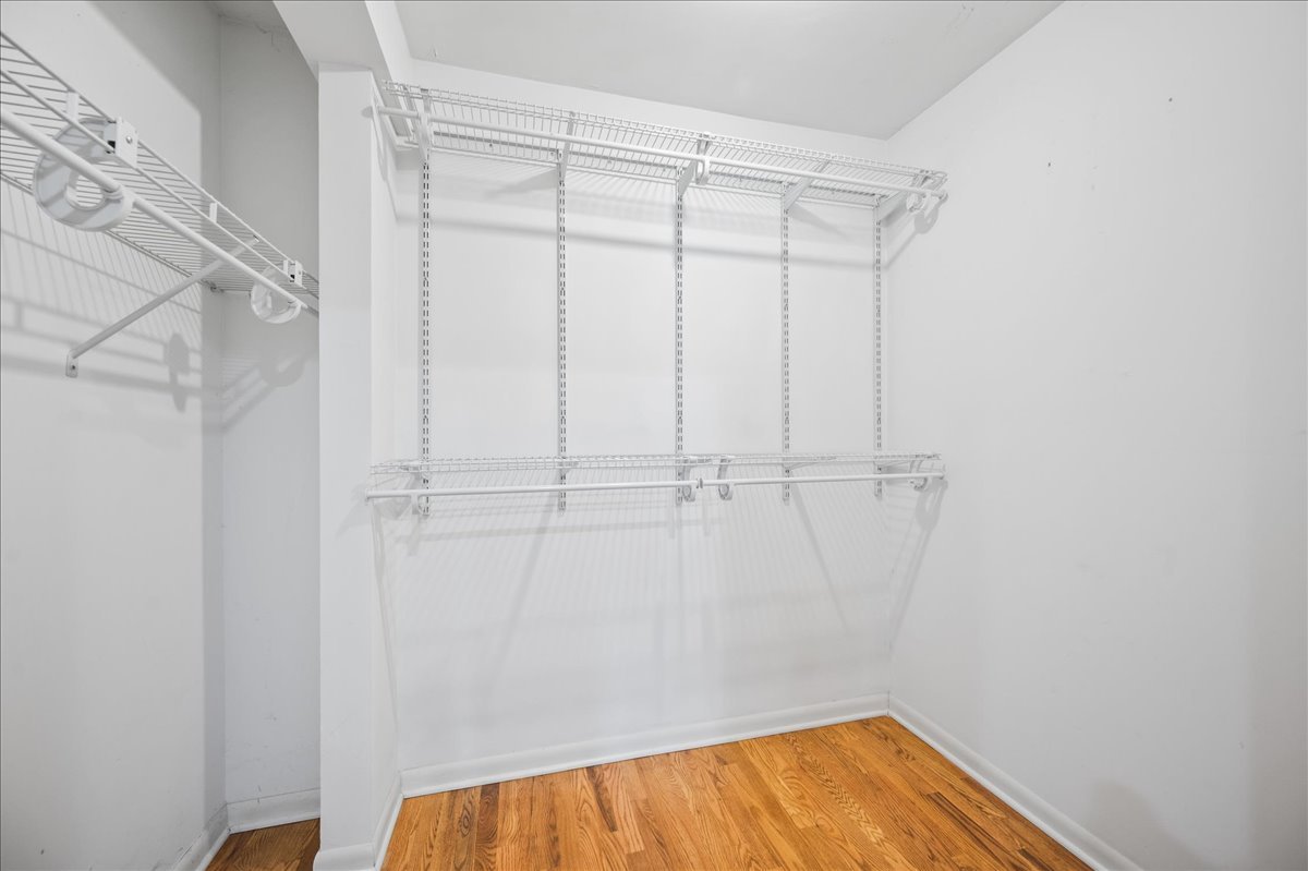 203 Coldren Drive Prospect Heights, IL 60070 - Photo 22 of 31 a view of a room with wooden floor