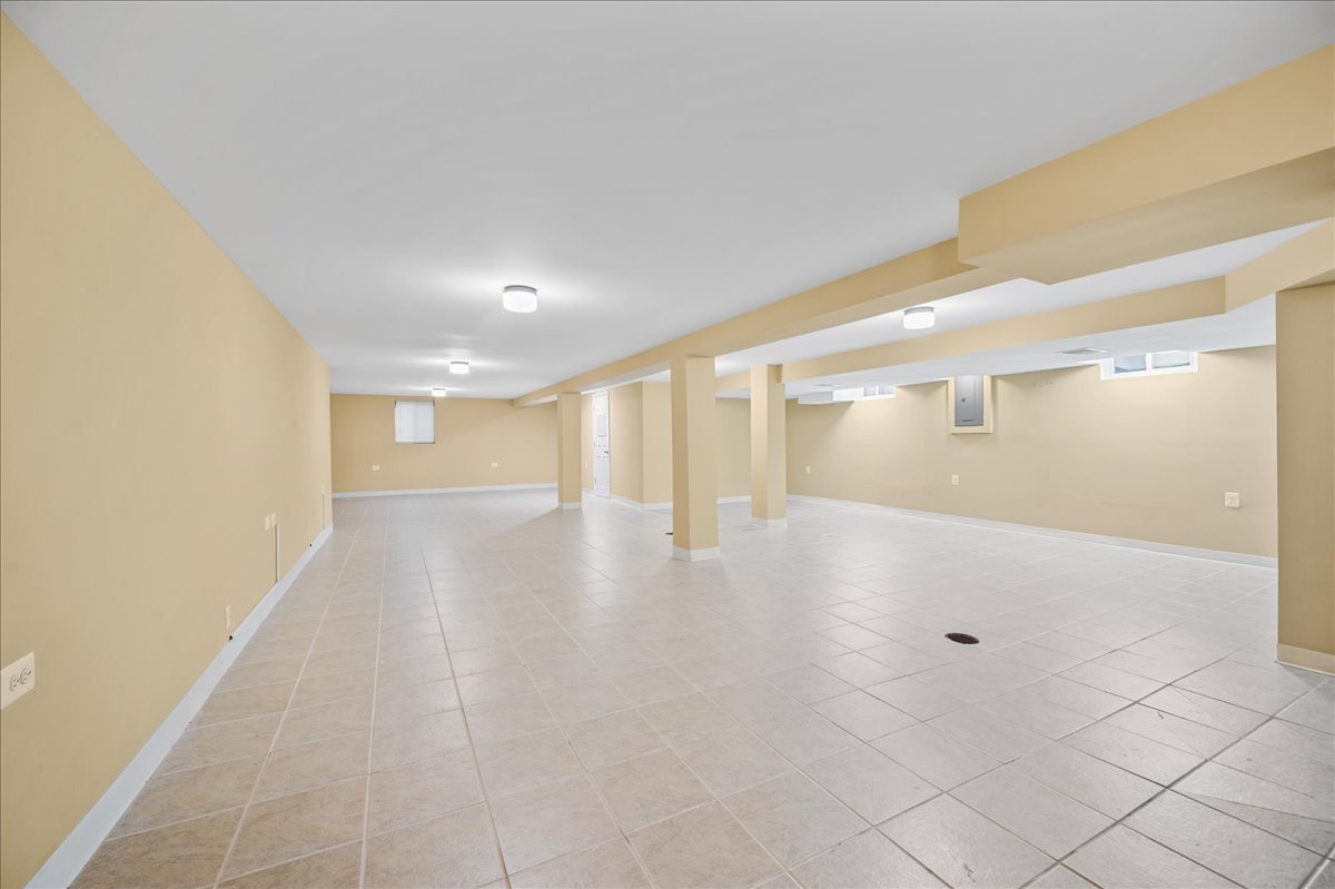 203 Coldren Drive Prospect Heights, IL 60070 - Photo 27 of 31 a view of a hallway with wooden floor