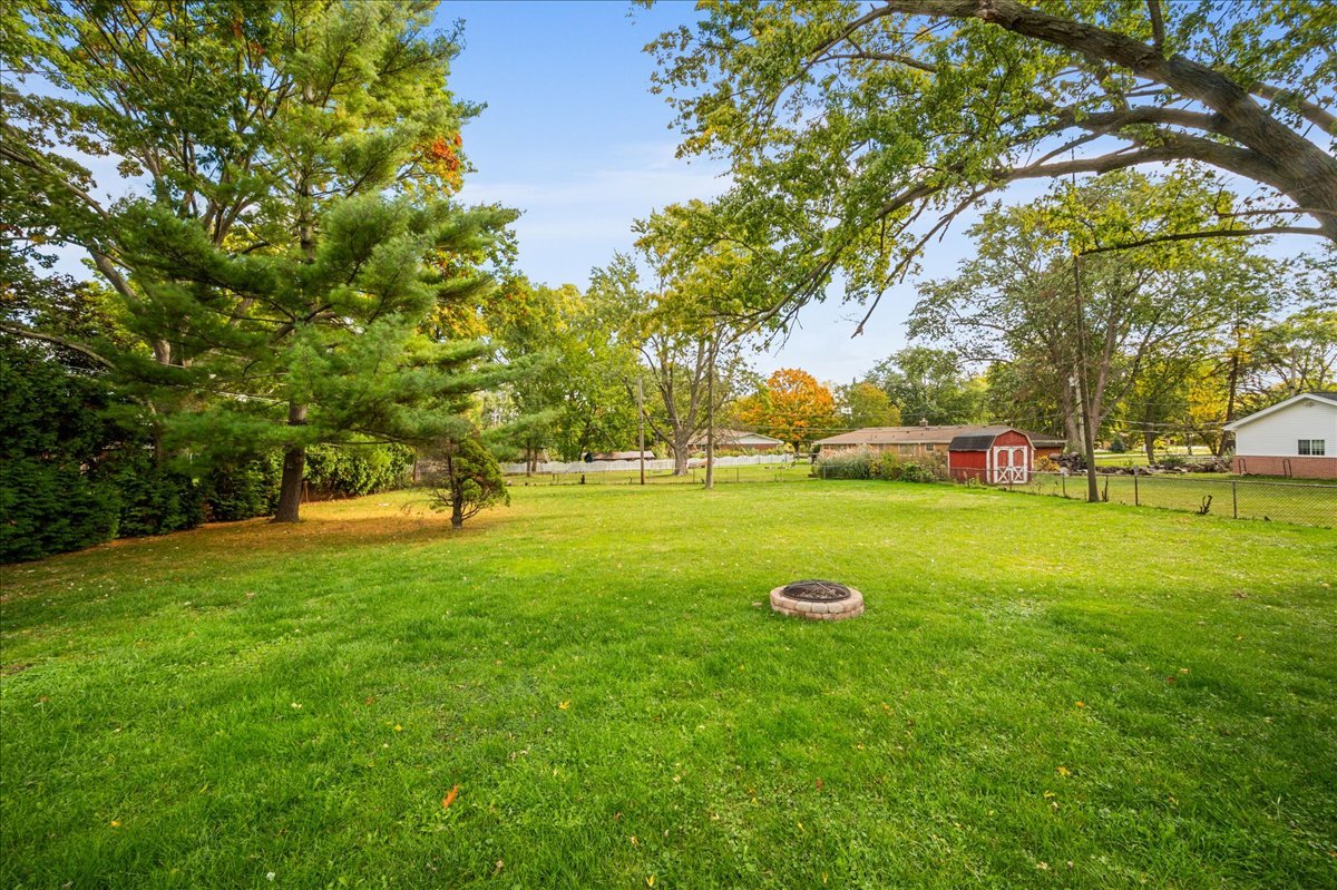 203 Coldren Drive Prospect Heights, IL 60070 - Photo 31 of 31 a view of a tree in front of a house