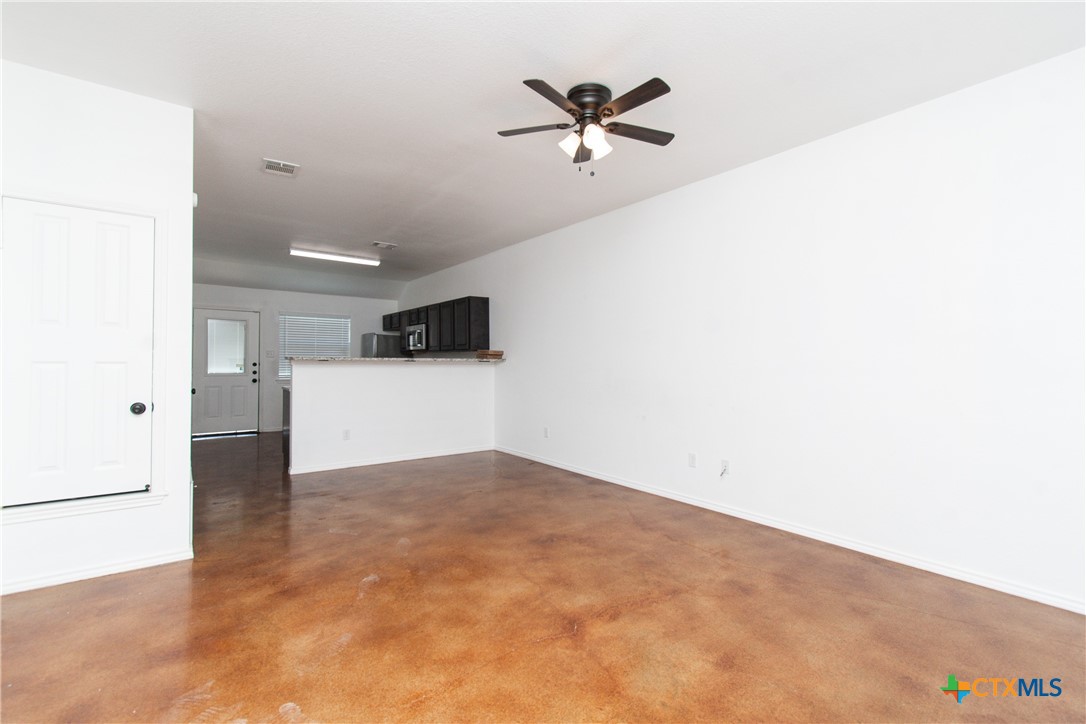 235 North Mary Jo Drive, Unit A Harker Heights, TX 76548 - Photo 2 of 16 a view of a livingroom with a stove and a refrigerator
