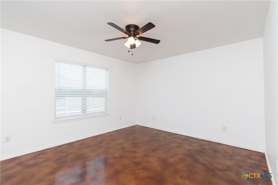 235 North Mary Jo Drive, Unit A Harker Heights, TX 76548 - Photo 6 of 16 an empty room with a window and a fan