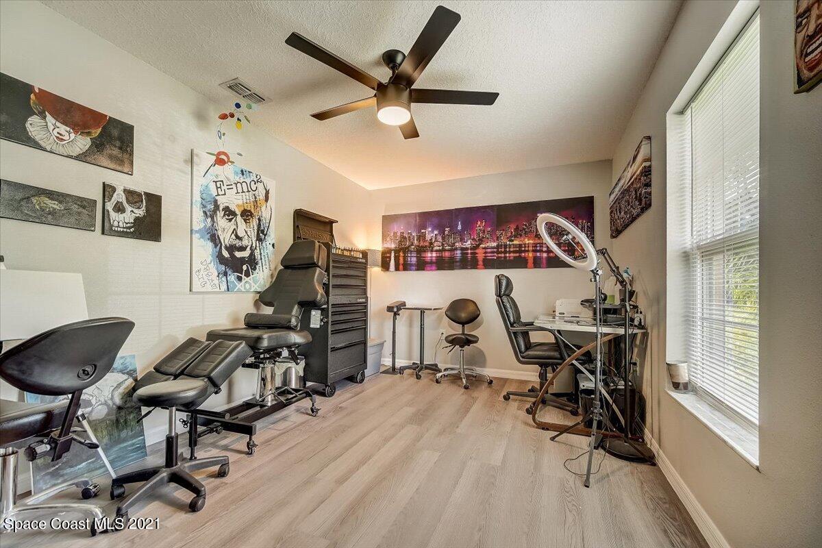1459 Saxony Road Southwest Palm Bay, FL 32908 - Photo 21 of 38 a view of a room with gym equipment