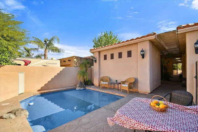 a front view of house with yard outdoor seating