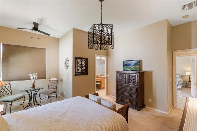 a bedroom with a bed and furniture