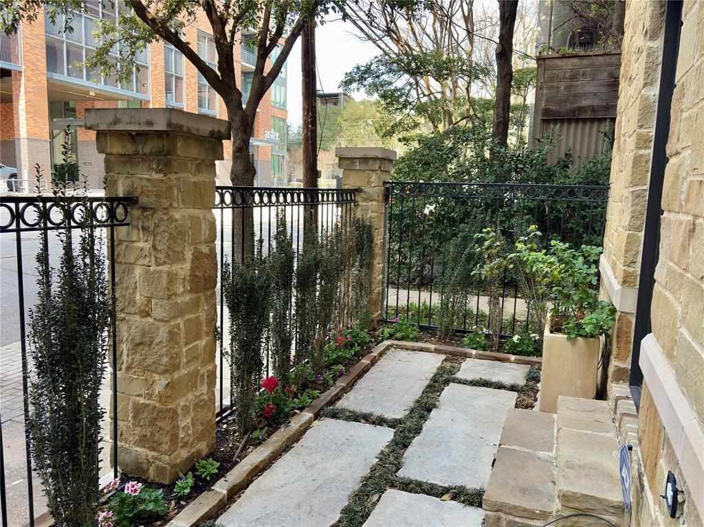 2811 Hood Street, Unit B Dallas, TX 75219 - Photo 11 of 30 a view of a pathway with a yard