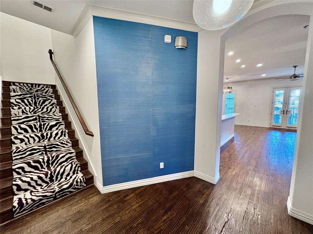 2811 Hood Street, Unit B Dallas, TX 75219 - Photo 14 of 30 a view of an empty room with wooden floor