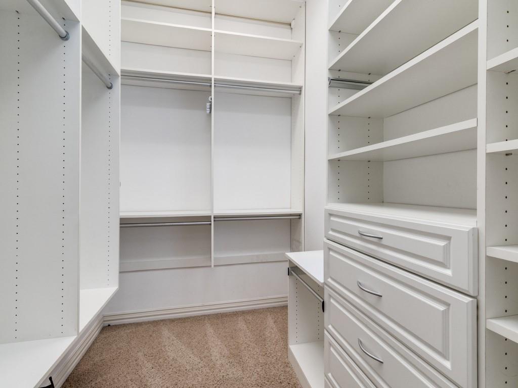 2811 Hood Street, Unit B Dallas, TX 75219 - Photo 17 of 30 a view of walk in closet with empty racks