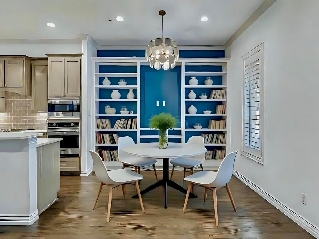 2811 Hood Street, Unit B Dallas, TX 75219 - Photo 5 of 30 a view of a dining room with furniture and wooden floor