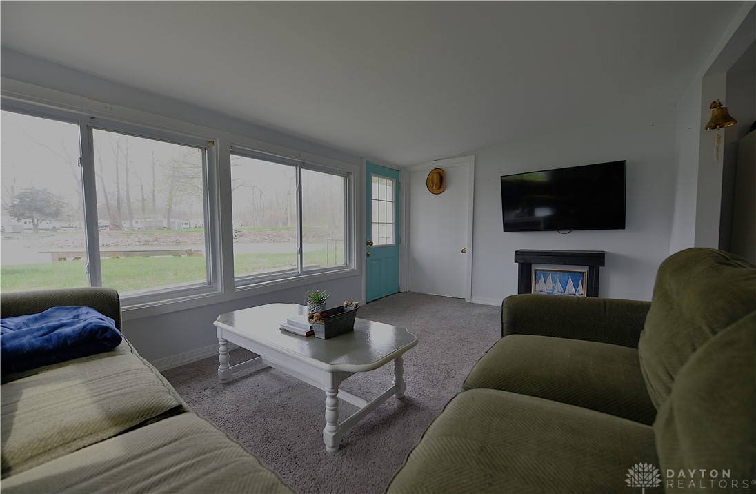 5445 Behm Road, Unit 15 Celina, OH 45822 - Photo 15 of 49 This bright living space offers comfort and expansive views, perfect for serene living.