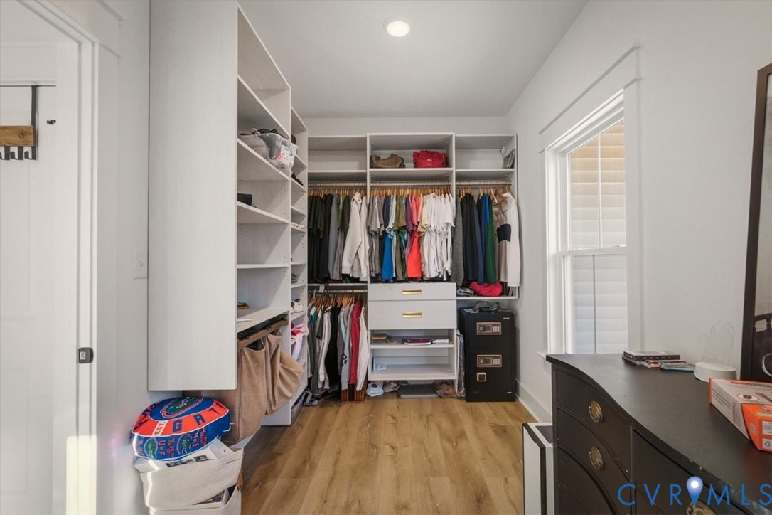 702 Hockett Road Manakin-Sabot, VA 23103 - Photo 13 of 45 a view of walk in closet with clothes and shoes
