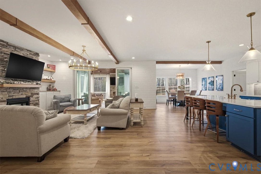 702 Hockett Road Manakin-Sabot, VA 23103 - Photo 17 of 45 a living room with fireplace furniture and a flat screen tv