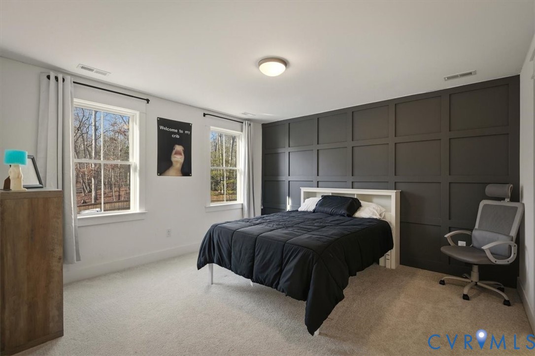 702 Hockett Road Manakin-Sabot, VA 23103 - Photo 31 of 45 a bedroom with a bed and a window