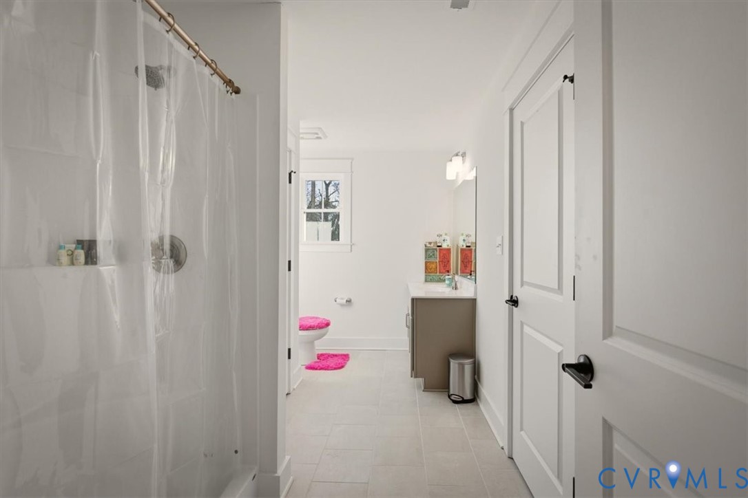 702 Hockett Road Manakin-Sabot, VA 23103 - Photo 33 of 45 a bathroom with a shower and a sink